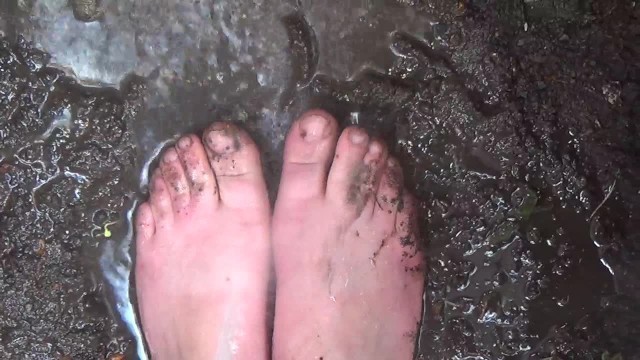 DIRTY FEET IN THE MUD