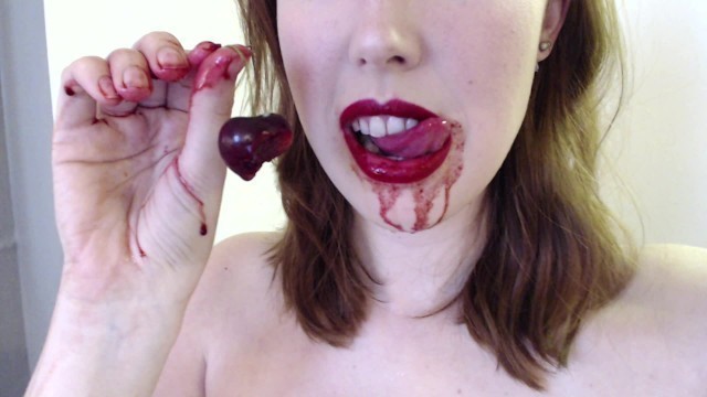 Redhead Eating Fruit Seductively Dripping on Tits and Bush