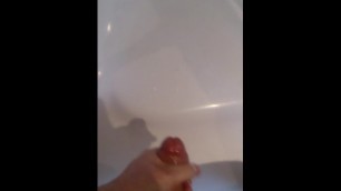 oily jerk and cumshot while fingering ass